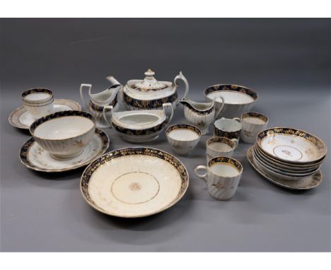 Early 19th Century English part tea service decorated with a blue and gilt band 