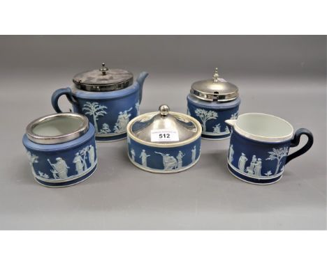Wedgwood blue Jasperware three piece tea service together with two other jars with plated covers 