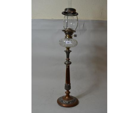 19th Century copper and metal (previously silver plated) oil lamp base with cut glass well, 36.5ins high overall including th