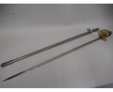 Toledo bladed dress sword with gilt pierced basket and wooden grip, lions head pommel with steel scabbard 