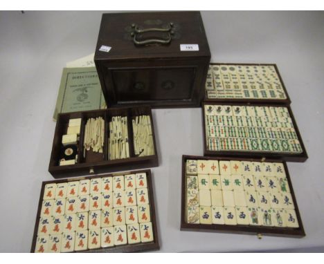 Early 20th Century Mahjong set in hardwood case with bone and bamboo countersCondition as shown in photos. Two of the four sp