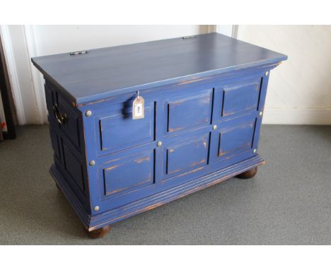Exotic hardwood trunk with hinged cover and panelled front and sides 