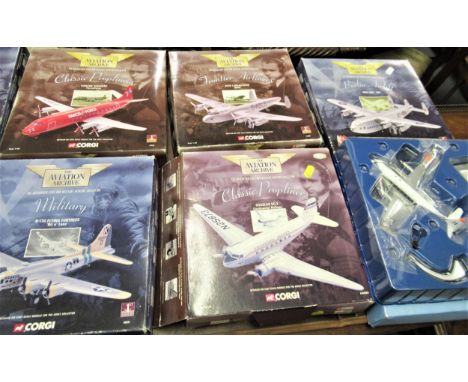 Box containing a quantity of Corgi aviation models 