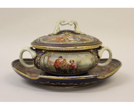 Small 19th Century Sevres tureen, cover and stand painted with panels of figures in landscapes and interiors, on a royal blue