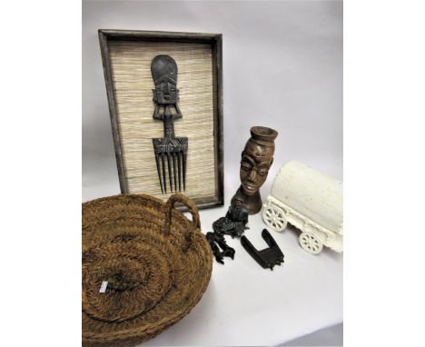 African hardwood figural hair comb, framed, two other items of African native wood carving, a woven grass basket, painted mod