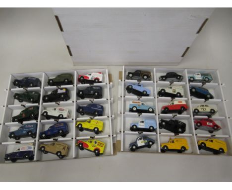 Box containing two trays of mainly Corgi diecast model vehicles of advertising Morris Minor vans 