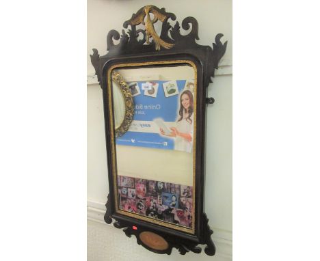 19th Century mahogany inlaid and parcel gilt wall mirror with fretwork mounts in Chippendale style, 36ins highTop left corner