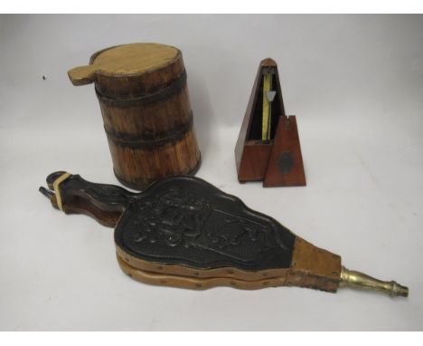 Late 19th / early 20th Century iron bound wooden vessel with cover, pair of carved wooden bellows, mahogany metronome (at fau