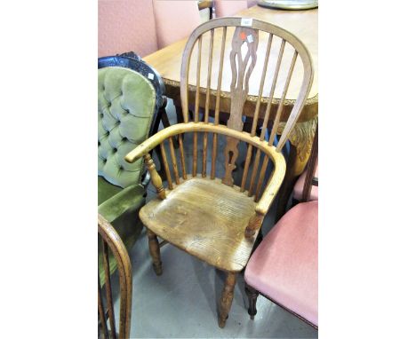 19th Century ash and elm Windsor armchair, the hoop, stick and pierced splat back above a panel seat and turned supports with