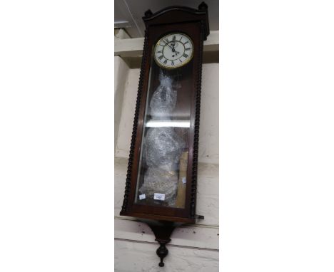 19th Century Continental rosewood Vienna type wall clock, the case with barley twist flanking pilasters, the painted dial wit