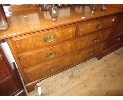 Late 19th / early 20th Century walnut chest of two short and two long drawers with brass handles and bracket feet, 48ins wide