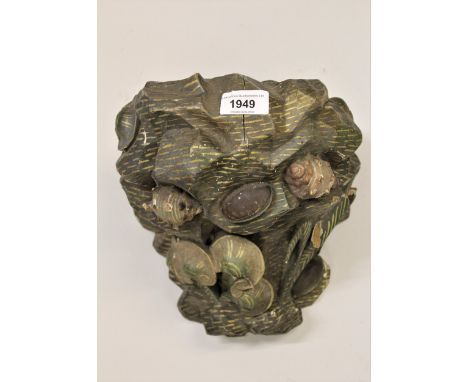 19th Century Continental carved and painted wall bracket of naturalistic form decorated with seashells, 8ins x 8ins approxima
