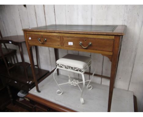 Edwardian mahogany crossbanded writing desk with green rexine inset top above two draws with brass handles, on square taperin