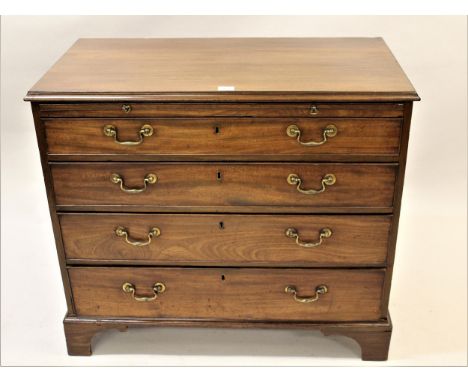 George III mahogany bachelor chest having moulded top with pull-out slide over four graduated long drawers with brass swan ne