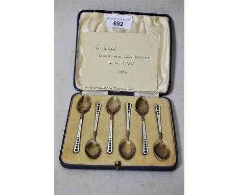 Set of six Birmingham silver white and black enamel coffee spoons in fitted box 