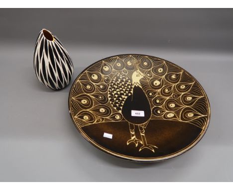 Poole pottery ' Aegean ' charger decorated with a peacock, 16ins diameter together with a Beswick pottery vase decorated in a