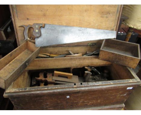 19th Century carpenter's trunk containing a quantity of various planes, chisels, saws etc. 
