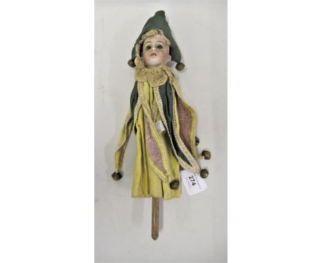 Late 19th / early 20th Century hand held doll / puppet having bisque head with glass eyes, open mouth and four teeth, in a je