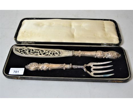 Cased silver plated fish knife and fork with embossed silver weighted handles 