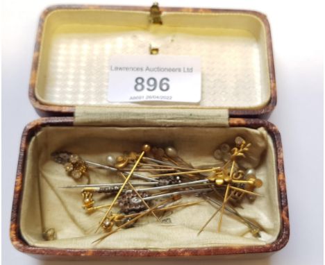 Diamond solitaire stick pin, together with a quantity of other stick pins 