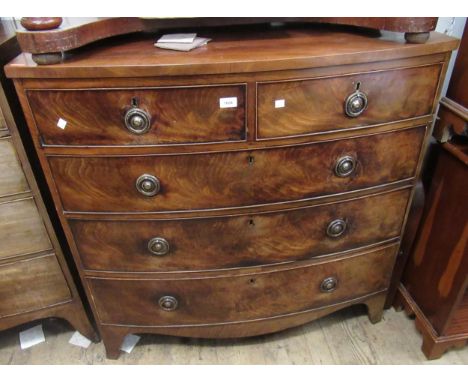 19th Century mahogany bow front chest of two short and three long graduated drawers with brass ring handles and bracket feet,