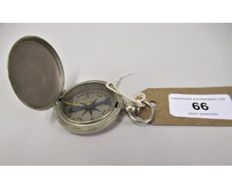 20th Century steel cased compass with silvered dial, inscribed Whittnauer, the outer case stamped U.S 