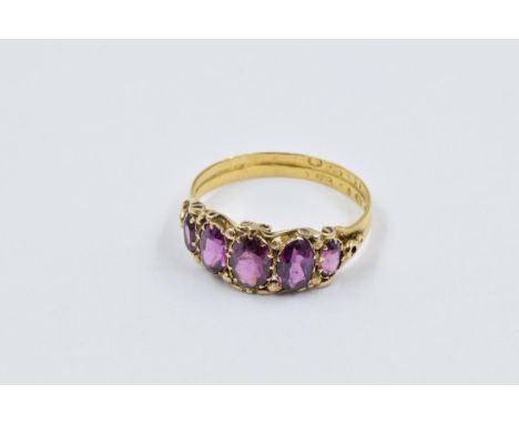 22ct Gold five stone amethyst ring, 2.1gA Victorian ring with signs of general wear commensurate with age but with no damage 