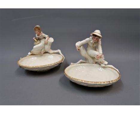 Pair of 19th Century Royal Worcester Kate Greenaway figural bonbon dishes, 6.5ins high x 6.5ins wide 