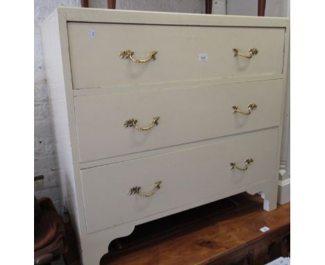 20th Century white painted chest of three long drawers on shaped bracket feet 