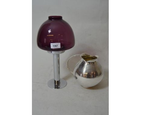 Chrome storm lamp with amethyst glass shade labelled Hans-Agne Jacobsson, Sweden, 13.5ins high together with a plated jug mar