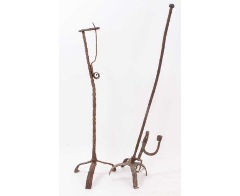 18th century wrought iron floor standing rush light, 77cm high and another similarProvenance: Estate of the Late Jane Sumner