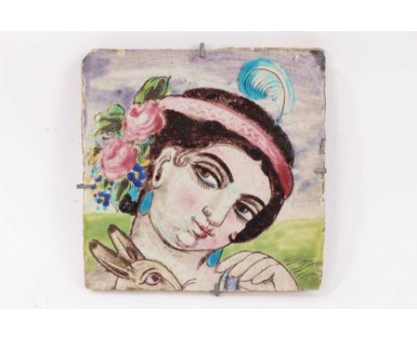 Persian Qajar polychrome tile, painted with the head of a woman, 21.5cm x 21.5cmCondition report: Chips on the edges and back