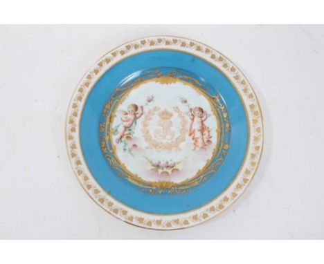 Sevres porcelain cabinet plate with handpainted putti pattern within a bleu ciel border with gilt, 23.5cm diameterProvenance: