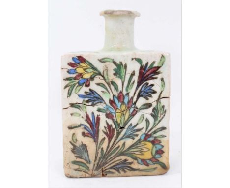 Isnik pottery vase/flask of square form, painted with flowers, 17cm heightCondition report: Heavily repaired. 