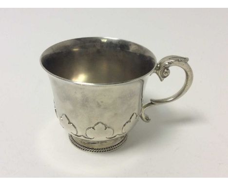 Elizabeth II Silver Christening Cup with Gothic style decoration, scroll handle with serpent mount, on circular foot, (London