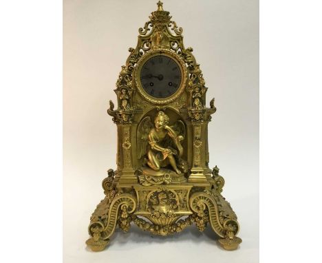 Good quality French Charles X ormolu mantle clock with ornate cast cherubs , lion mask and knights helm decoration , French 8