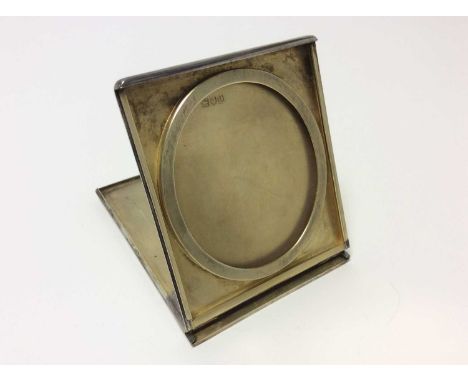 Unusual late Victorian silver travelling photograph frame of rectangular form with sliding, folding action and gilded interio