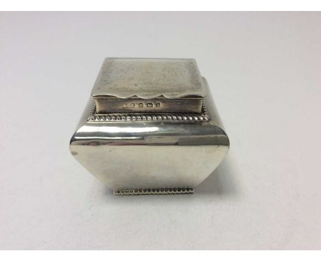 Edwardian silver tea caddy of bombe form, with gadrooned borders and domed hinged cover with gilded interior (Birmingham 1908
