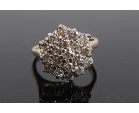 Diamond cluster ring with a hexagonal cluster of 19 brilliant cut diamonds in tiered claw setting on 18ct yellow gold shank, 