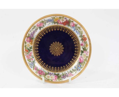 Antique Sevres dish, finely painted with flowers around the edge, the centre with gilt patterns on a bleu lapis ground, print