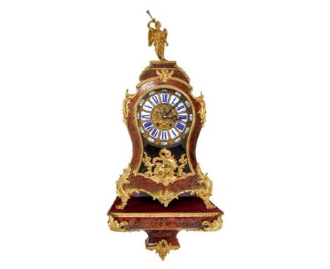 19th century French Louis XIV revival bracket clock in boulle work case on matching bracket. The ornate red tortoishell and o