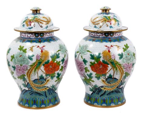 Pair of highly decorative Chinese cloisonné enamel baluster urns and covers, of large size, decorated with phoenixes and flow