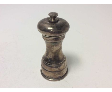 Elizabeth II silver pepper grinder of conventional form, (Sheffield 1971), maker B D, 10.5cm in heightProvenance: Estate of t