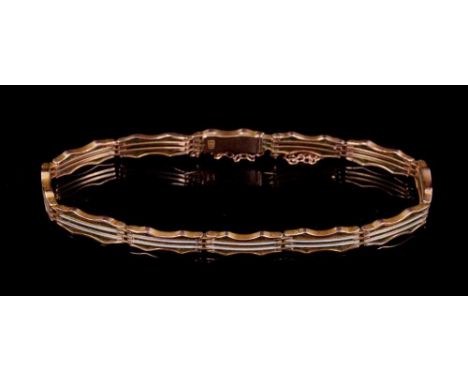 Edwardian 9ct rose gold and white enamel gate bracelet concealed clasp, approximately 19cm length.Condition report: Very good