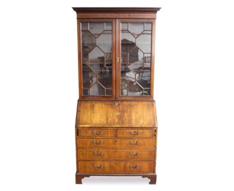 Late 19th century inlaid mahogany bureau bookcase, with dentil moulded cornice, the upper section with astragal glazed doors 