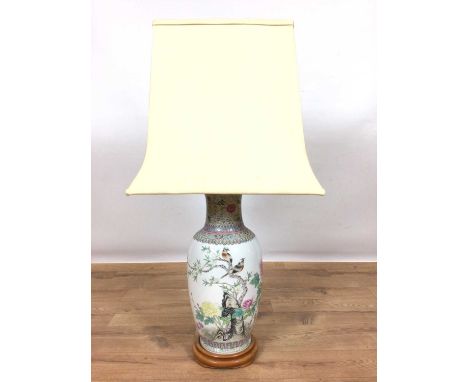 Chinese porcelain baluster vase lamp, decorated in the famille rose palette with flowers and birds and arabesque borders, on 