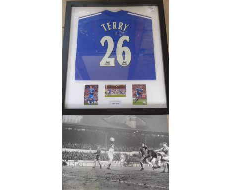 A framed Chelsea number 26 shirt, personally signed by John Terry, COA on reverse on the frame - frame size 82.5cm x 70cm, in