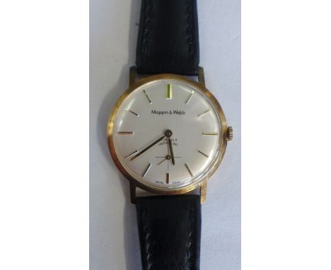 A Mappin and Webb 1979 9ct manual wind gents wristwatch - 35mm wide including button, on a leather strap, total weight approx