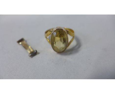 A 22ct gold citrine ring, size K, approx 4.2 grams, together with a 9ct gold clip reducer, ring in good condition 