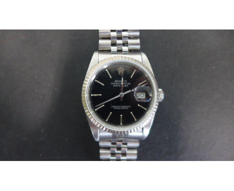 A gents Oyster perpetual Datejust Rolex - stainless steel wristwatch with black dial, 37mm wide including button, L454018 - 1